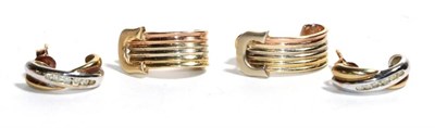 Lot 273 - A pair of 9 carat two colour gold diamond set cuff earrings; and a pair of three colour cuff...