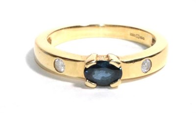 Lot 274 - An 18 carat gold sapphire and diamond ring, finger size L1/2