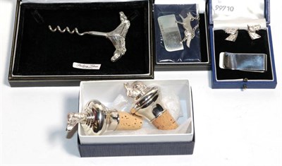 Lot 289 - A pair of modern silver bottle stoppers with finials modelled as a dog and a rabbit; a novelty cast