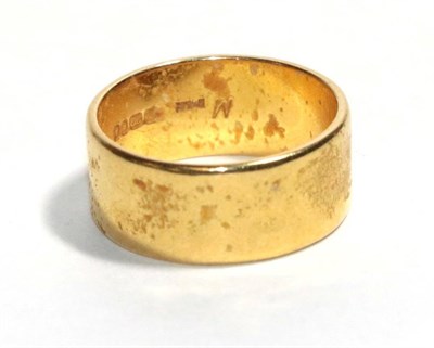 Lot 293 - A 22 carat gold band ring, finger size L1/2
