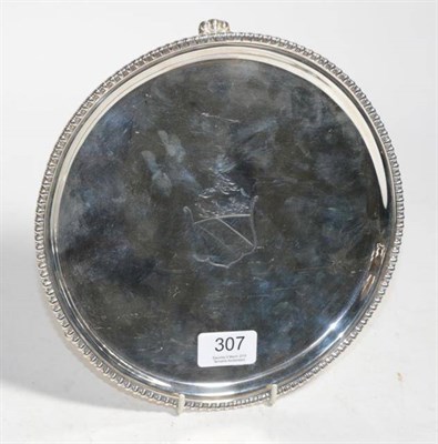 Lot 307 - A George III circular silver salver, maker's mark indistinct, Sheffield 1814, with gadroon...