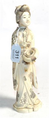 Lot 311 - An ivory okimono of a Japanese lady, circa 1910