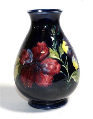 Lot 313 - A Moorcroft blue ground vase, with paper label to base