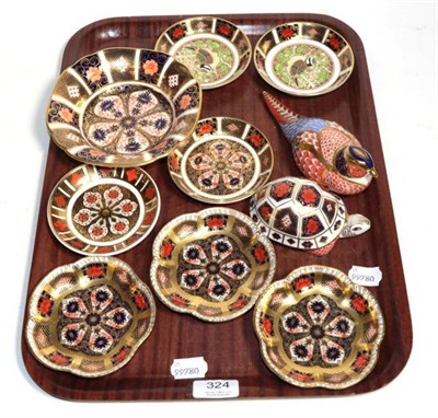 Lot 324 - A selection of Royal Crown Derby Imari pattern items consisting of pin trays; two paperweights...