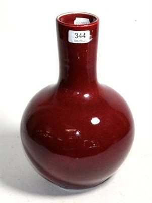 Lot 344 - A Chinese sang-de-boeuf bottle vase, 33cm high