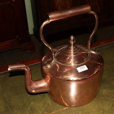 Lot 370 - A copper kettle