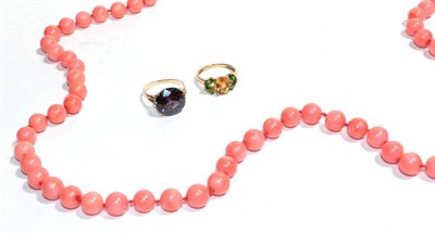 Lot 374 - A coral necklace with clasp stamped 14k, length 96cm; a 9 carat gold citrine and tourmaline...