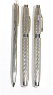 Lot 375 - A modern silver fountain pen, ballpoint pen and propelling pencil, marks of BMS, Birmingham...