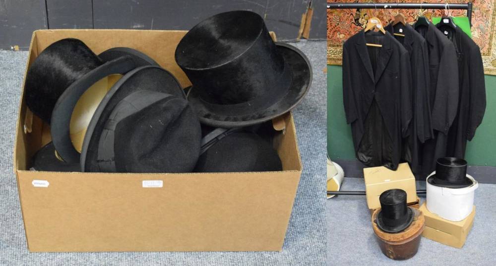 Lot 1011 - Dunn & Co and other moleskin top hats and bowler hats, together with four mourning coats