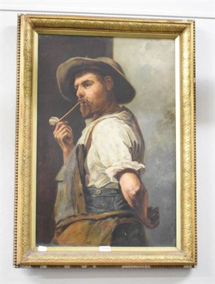 Lot 1104 - British School, early 20th century portrait of a worker smoking oil on canvas, together with a...