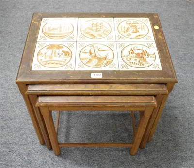 Lot 1180 - A set of three Danish tile inset nesting tables