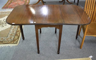 Lot 1181 - A mahogany gateleg dining table