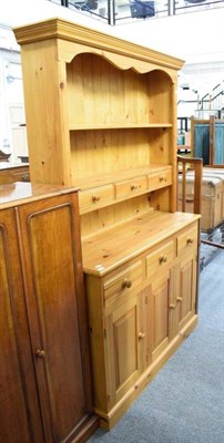 Lot 1194 - A pine dresser and rack