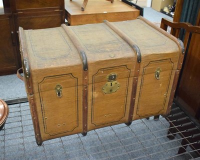 Lot 1199 - A wooden bound canvas trunk