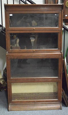 Lot 1211 - An oak Globe Wernicke type stacking bookcase, together with elements from a further bookcase