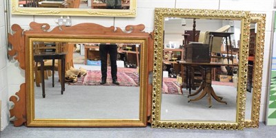 Lot 1215 - A pair of reproduction gilt framed mirrors together with an oversized reproduction fretwork mirror