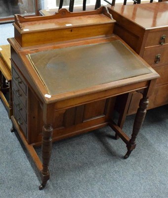 Lot 1216 - An Edwardian mahogany Davenport of large proportions (a.f.)