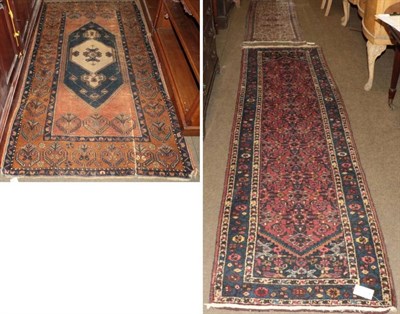 Lot 1233 - Narrow Hamadan runner, the Herati field enclosed by indigo borders, 275cm by 76cm; together...