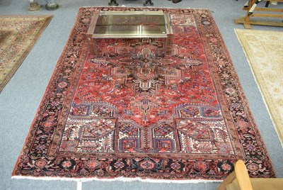 Lot 1238 - Heriz Carpet, Iranian Azerbaijan, the field centred by a cruciform medallion framed by samovar...