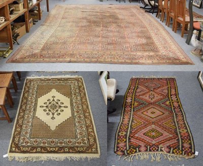 Lot 1239 - Machine made carpet, the brick red field with columns of willow trees, enclosed by floral...