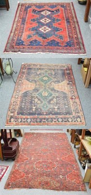 Lot 1240 - Afshar rug, South East Iran, the indigo field with three diamond medallions, enclosed by...