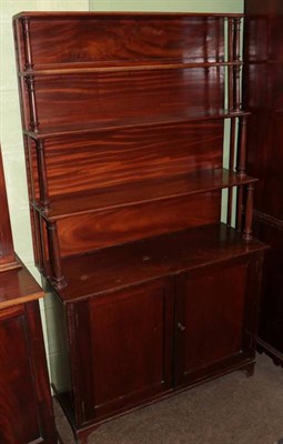 Lot 1275 - A Victorian mahogany waterfall bookcase with cupboard doors below