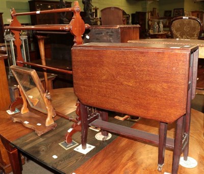 Lot 1304 - A late Victorian mahogany towel horse; an Edwardian mahogany Sutherland table and a small Victorian