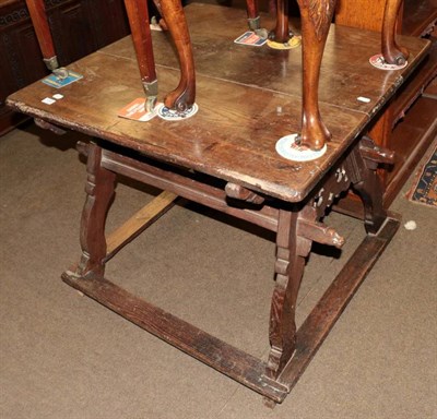 Lot 1308 - A 19th century oak camel saddle converted to a table