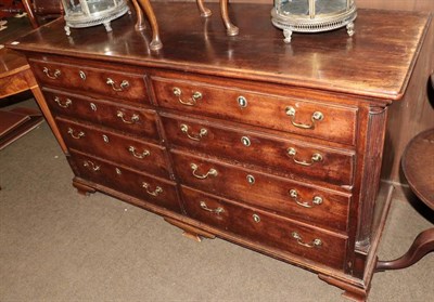 Lot 1311 - A late George III mahogany mule chest with four dummy drawers and four real drawers, on bracket...