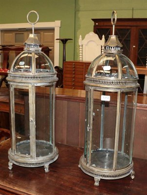 Lot 1312 - A pair of gilt metal and glass lanterns (modern)