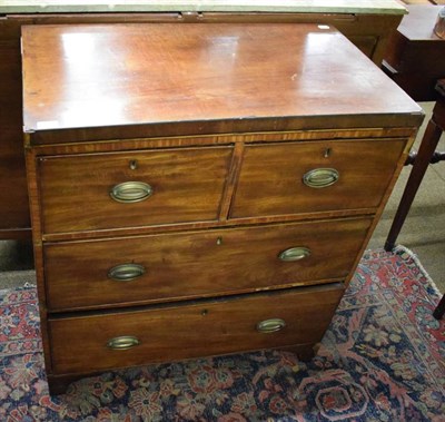 Lot 1314 - A 19th century mahogany three height chest of drawers, on bracket feet