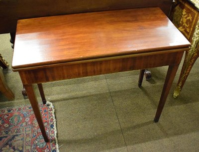 Lot 1324 - George III mahogany tea table on square tapering legs and a demi lune table on turned legs with...