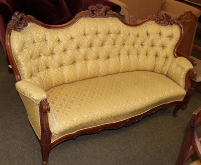 Lot 1331 - A Victorian style button back settee and cane chair