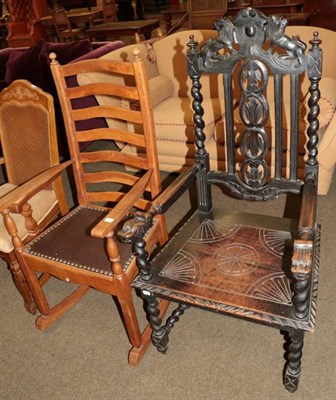 Lot 1332 - A Victorian carved oak open armchair with boarded seat and a ladder back rocking chair with a close