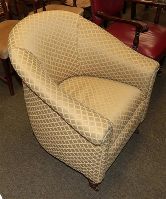 Lot 1334 - An early 20th century upholstered tub chair