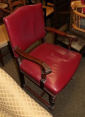 Lot 1335 - A leather upholstered mahogany open armchair