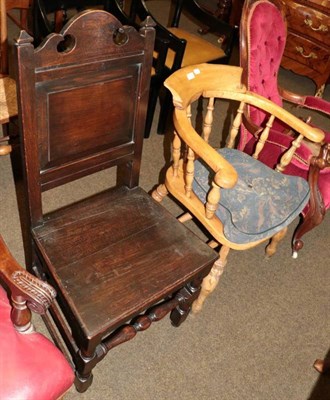 Lot 1336 - An oak side chair and a Captain's chair (2)