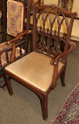 Lot 1344 - A George III mahogany armchair with Gothic style tracery splat