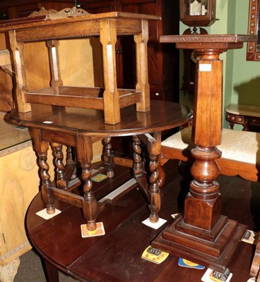 Lot 1370 - An oak coffee table; an oak drop leaf table and a plant pedestal (3)