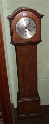 Lot 1379 - An inlaid chiming small longcase clock