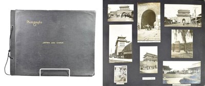 Lot 125 - Japan and China An album of portrait, landscape, street scenes and other photographs, early...