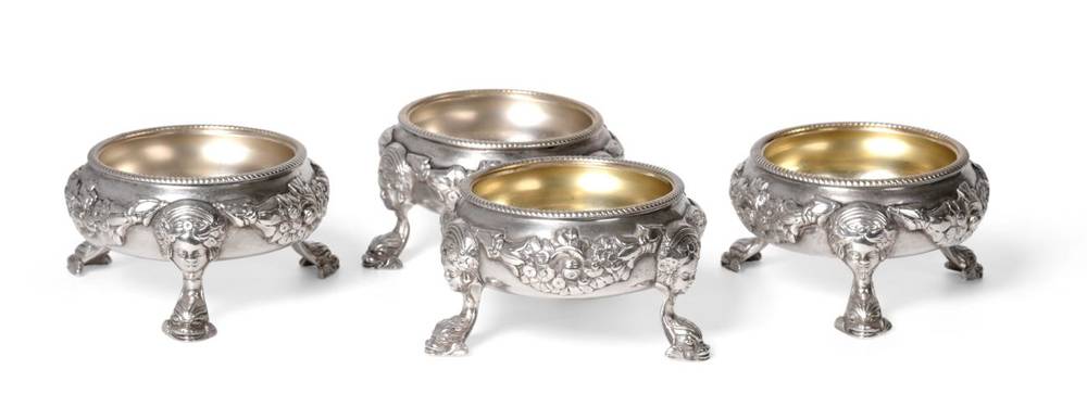 Lot 4 - ^ A Set of Four George III Silver Salts, Robert Hennell, London 1817, circular with gadroon...