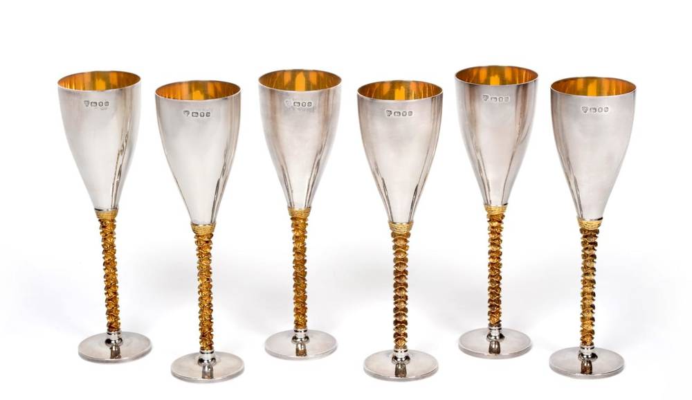 Lot 47 - A Set of Six Parcel Gilt Silver Champagne Flutes, C J Vander, London 1979, in the stlye of...