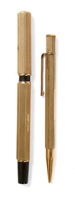 Lot 50 - A Waterman's Ideal 9ct Gold Sleeved Fountain Pen, London 1928, of engine turned heptagonal...
