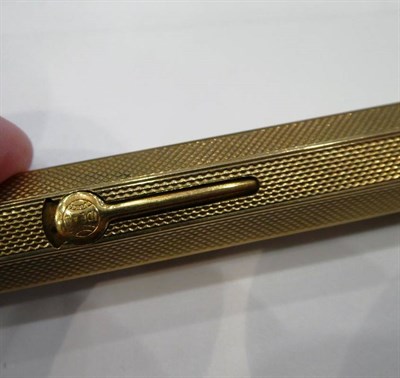 Lot 50 - A Waterman's Ideal 9ct Gold Sleeved Fountain Pen, London 1928, of engine turned heptagonal...