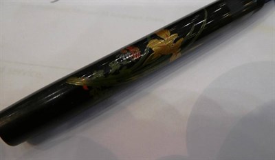 Lot 51 - A Namiki Maki-E Fountain Pen, 20th century, decorated with flowers, a lever filler stamped N,...