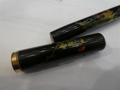 Lot 51 - A Namiki Maki-E Fountain Pen, 20th century, decorated with flowers, a lever filler stamped N,...