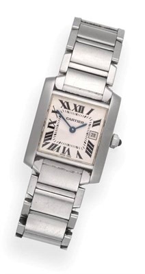 Lot 58 - A Stainless Steel Calendar Wristwatch, signed Cartier, model: Tank Francaise, ref: 2465, circa...