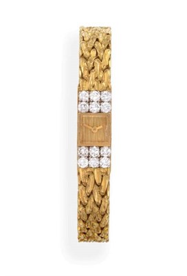 Lot 61 - ^ A Lady's 18ct Gold Diamond Set Wristwatch, signed Boucheron, Paris, 1961, (calibre 690),...