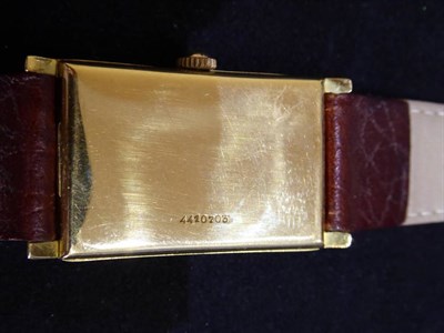 Lot 63 - An Art Deco 18ct Gold Curved Rectangular Wristwatch, signed Longines, 1925, (calibre 10.30)...